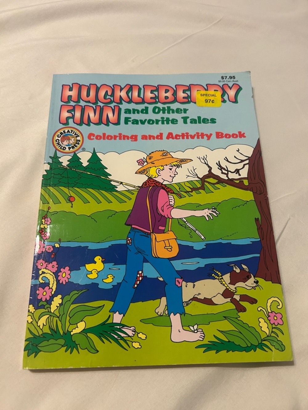🪁2/$7, 🎠4/$11 Huckleberry Finn coloring book 1994